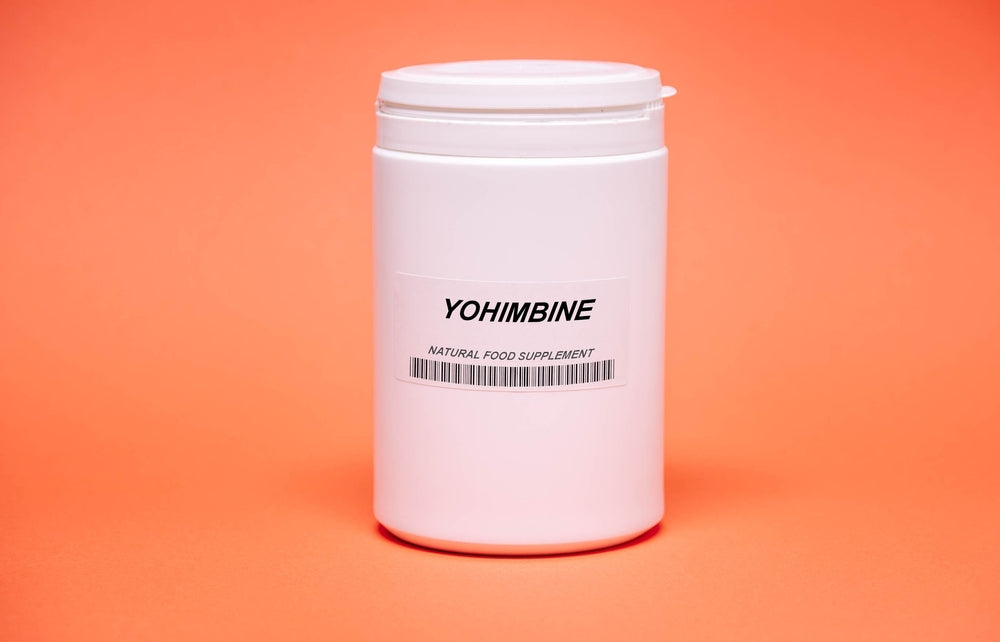 Bottle-of-yohimbine-a-natural-sleep-supplement-on-orange-background