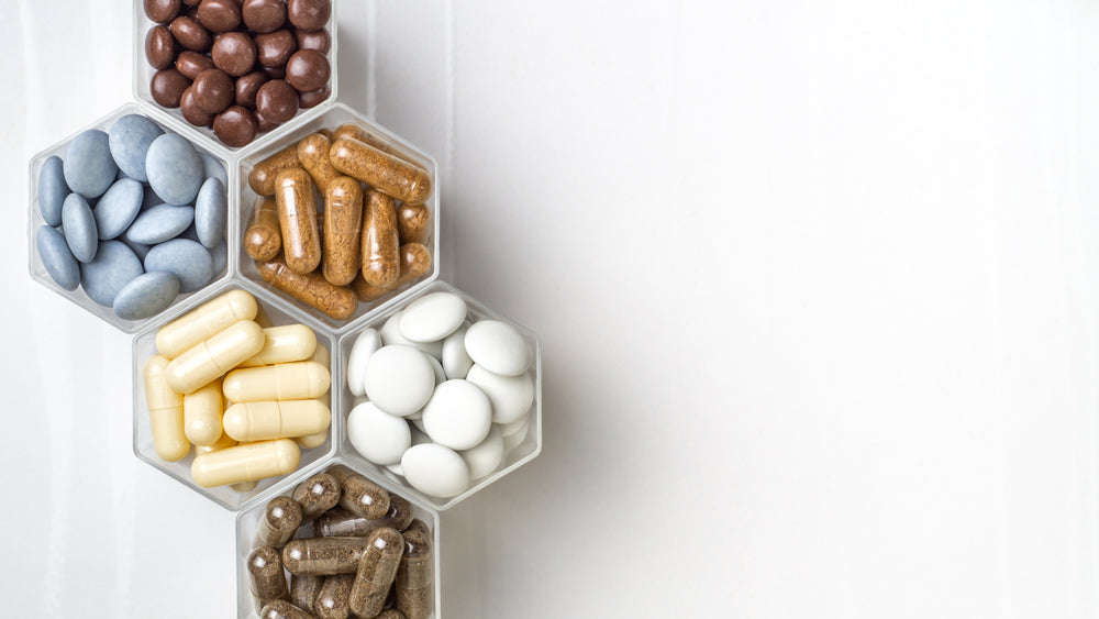 Various-capsule-and-pill-supplements-in-hexagonal-organization-tray